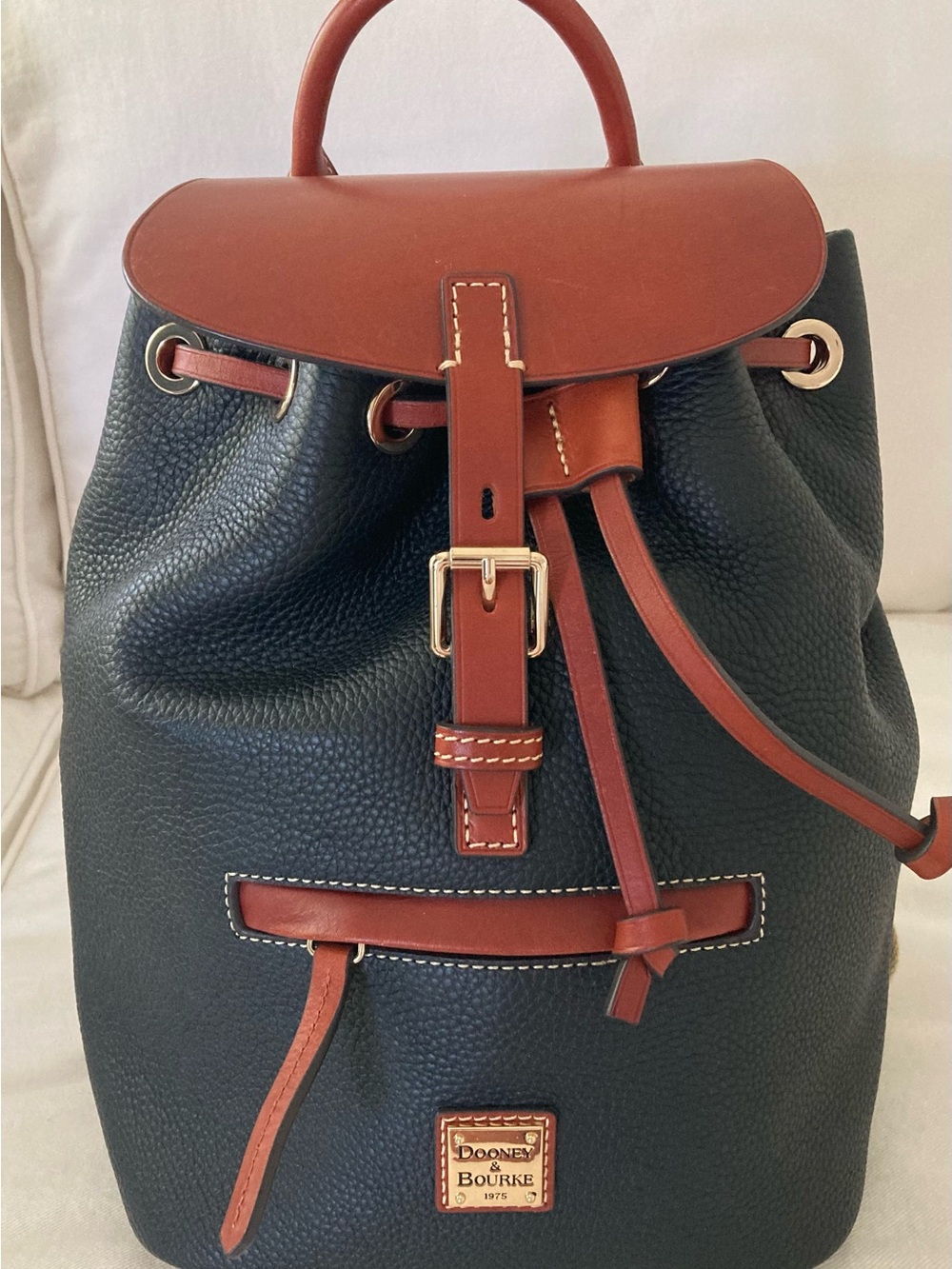 Dooney & Bourke Black Pebbled Leather Backpack with Brown Trim